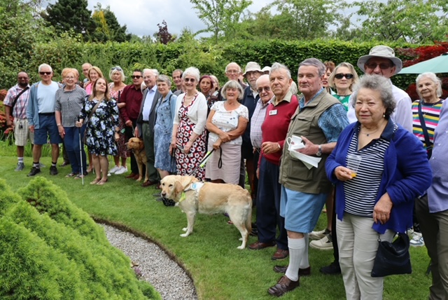 The whole group poses for a photo #1