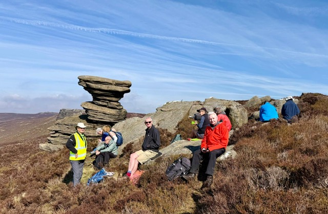 The group sitting scattered around on a Derwent hill